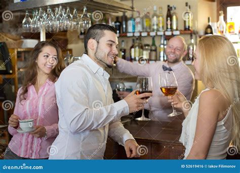 Bartender Entertaining Guests Stock Photo - Image: 52619416