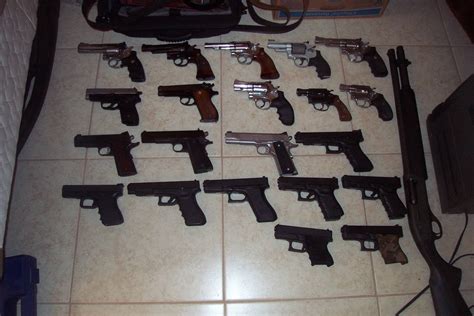 My gun collection when I was 20. I had such terrible taste. : guns