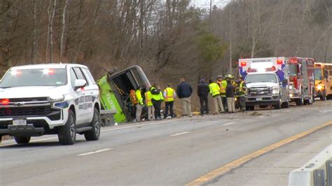 At least 1 dead, nearly two dozen injured after tour bus rolls over on ...