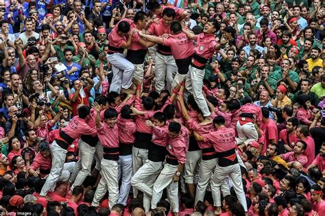 Stunning Photos Show Thousands Of People Competing To Build The Tallest Human Tower In Spain