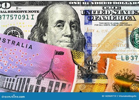 An Australian One Dollar Bill with a an American One Hundred Dollar Bill Stock Image - Image of ...