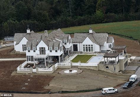 Carrie Underwood's new family mansion in Nashville pictured under ...