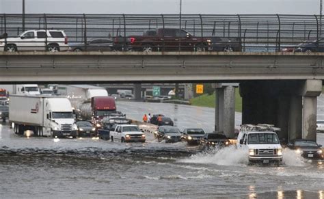 Tropical Storm Kills Two In Houston, Halts Flights, Floods Roads