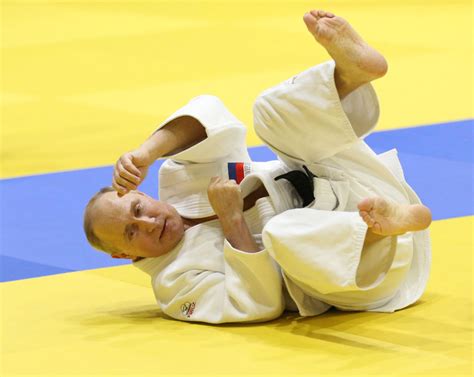 Putin stripped of taekwondo black belt and honorary judo title