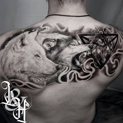 Two Wolves Fighting Tattoo