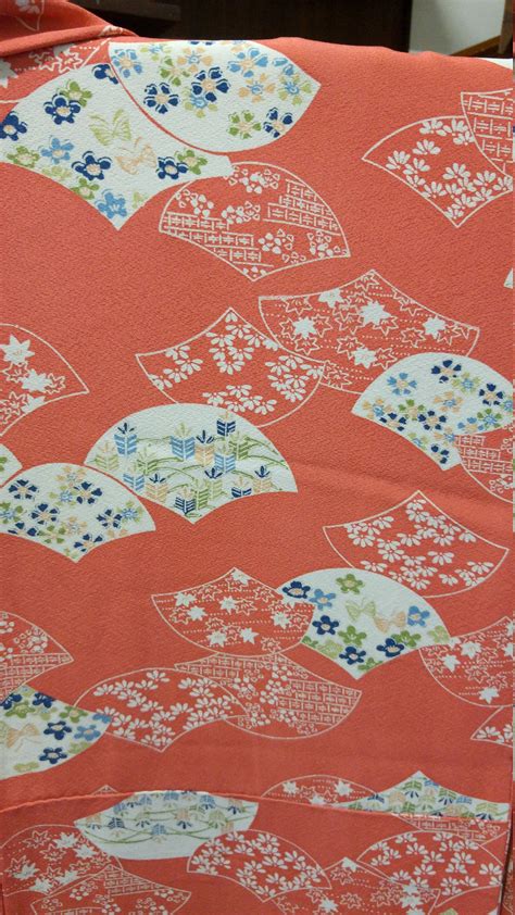 Vintage Japanese soft orange coloured silk kimono fans and flowers