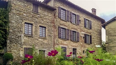 Perouges, France - Old stone building seen from outside the fortress ...