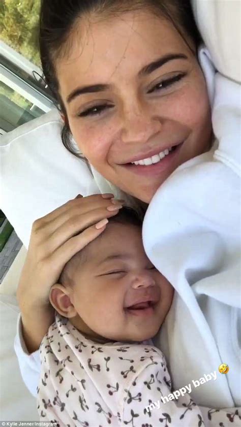 Kylie Jenner gushes over Stormi's sleepy smile...before flaunting her own post-baby figure ...
