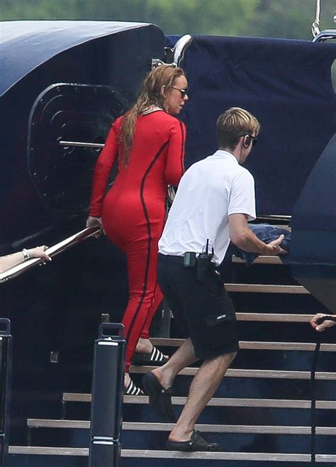 MARIAH CAREY in Wetsuit at a Boat in Caribbean 01/06/2016 – HawtCelebs