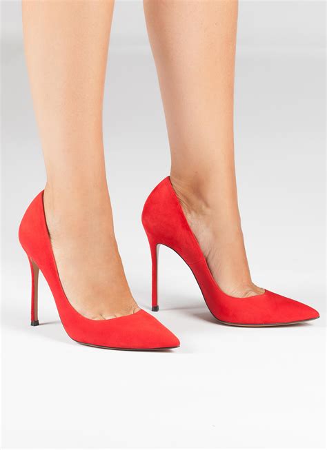 Red suede point-toe stiletto heel pumps . PURA LOPEZ