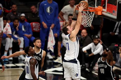 NBA roundup: Luka Doncic gets triple-double in Mavs' OT win | Reuters