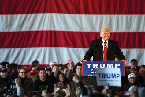 Photo of Donald Trump speaking at a podium to a crowd of people | MIT ...