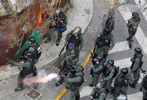 Venezuela: Violent scenes as anti-Maduro protesters clash with riot ...