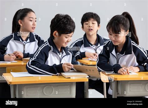 Chinese students learning in classroom Stock Photo - Alamy