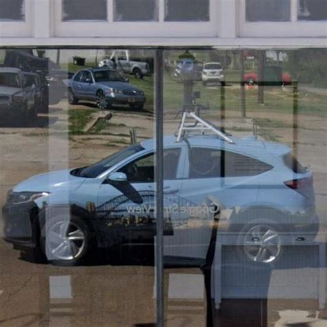 Google street view car reflection in Canton, MS (Google Maps)