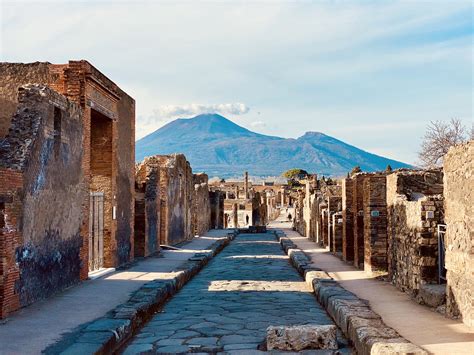 Mount Vesuvius rising above the ancient ruins of Pompeii : r/pics