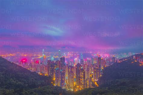Futuristic vaporwave look at Hong Kong from Victoria Peak at night stock photo