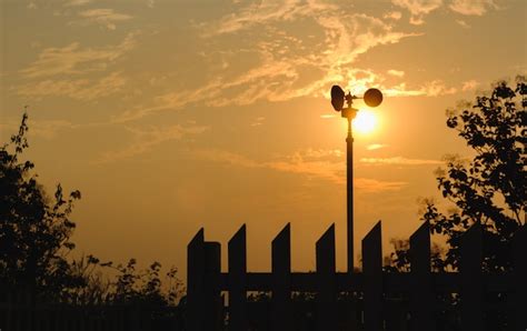 Premium Photo | Wind turbine, silhouette in sunset and sunrise