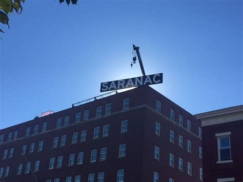 The Hotel Saranac getting its new sign | Historic hotels, Saranac lake ...