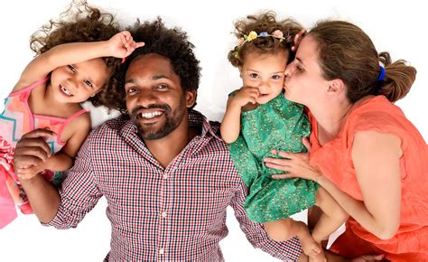 Happy interracial family isolated on white – Transitions Empowerment Associates