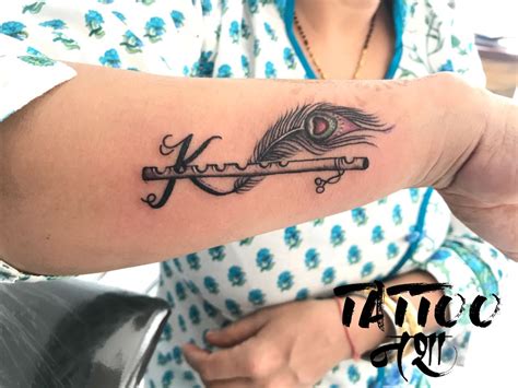 krishna tattoo name tattoo with flute feather with flute tattoo name with flute tattoo by anurag ...