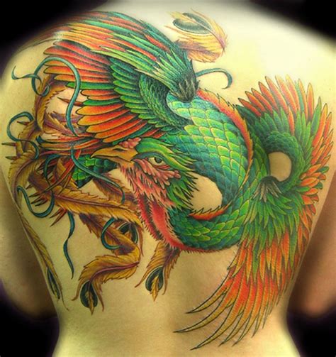 Green phoenix tattoo on whole back - Tattooimages.biz