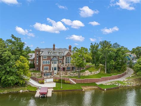 See inside $6.5M lakeside mansion with breathtaking views, hidden passageways, slides and man ...