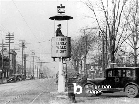 TRAFFIC LIGHT-America's first traffic light, Cleveland, Ohio, 1914. by