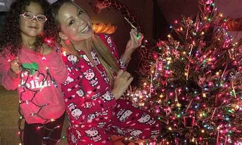 Mariah Carey celebrates snow day by putting up a decorated Christmas tree | Daily Mail Online