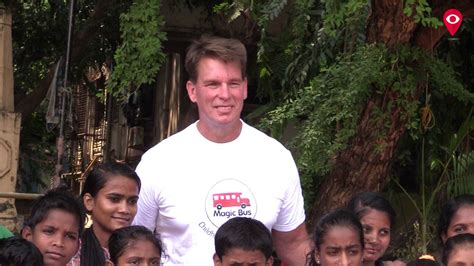 WWE wrestler John Bradshaw Layfield plays with Magic Bus Children at Shivaji Park