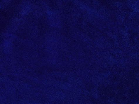 Blue velvet fabric texture used as background. Empty blue fabric ...