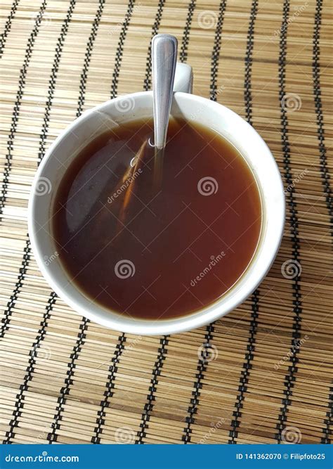 Black tea cup stock photo. Image of bamboo, drinking - 141362070