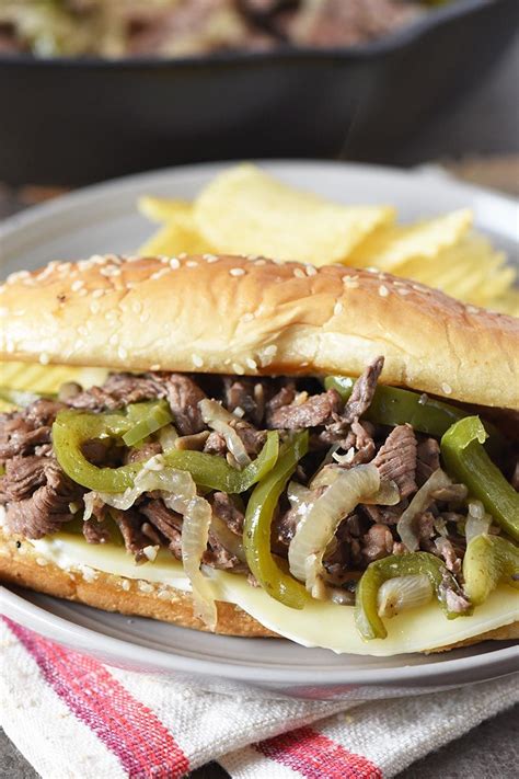 How to make the best Philly Cheesesteak ever, using sirloin steak, mushrooms, peppers, and ...