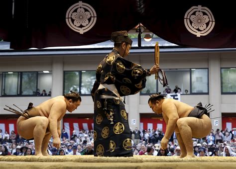 In pictures: Hakuho headlines somber spring sumo festival at Yasukuni ...