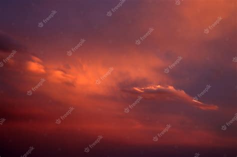 Premium Photo | Red clouds at sunset Dramatic sunset sky