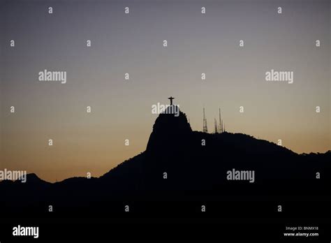 The iconic Cristo Redentor, Christ the Redeemer statue at sunset atop ...