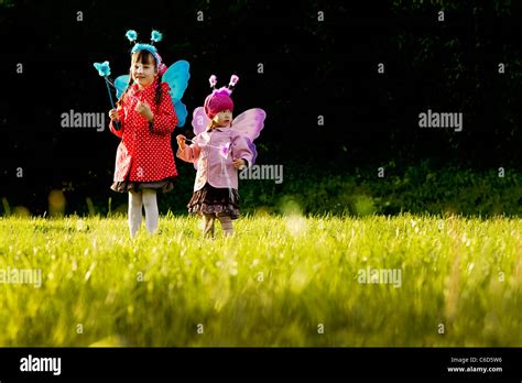 Girls with fairy wings Stock Photo - Alamy