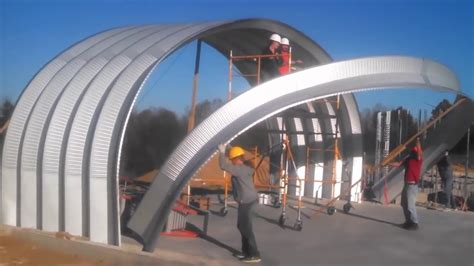 Arch Steel Quonset building construction - YouTube