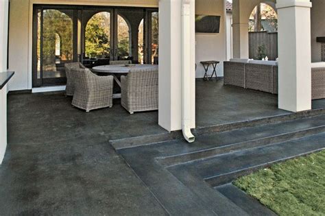 stained black concrete driveway - Google Search | Concrete stain patio, Patio stain, Patio