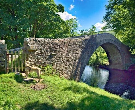 Ivelet Bridge, an ancient bridge over the River Swale in the Yorkshire Dales, built originally ...