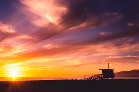 a purple red pink and orange sunset over santa monica beach, santa monica 4k HD Wallpaper