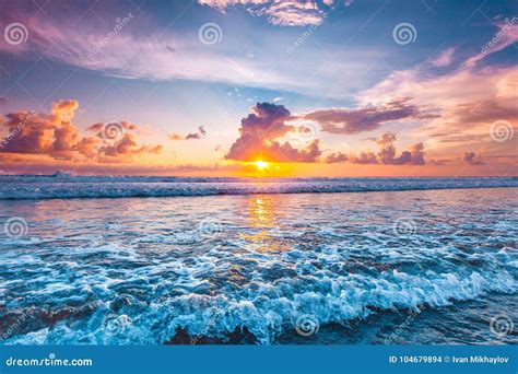 Sunset over ocean stock photo. Image of surf, sunset - 104679894