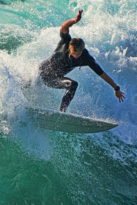 Surfer photography taken of the Oceanside, CA Pier. This pier gets you ...