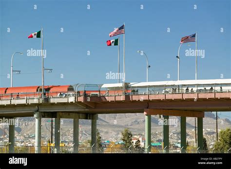 International border of Mexico the United States with flags and walking ...