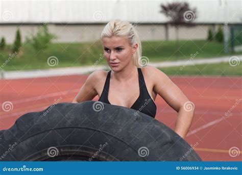 Young Man Doing Tire Flip Workout Outdoor Stock Photo - Image of nature ...