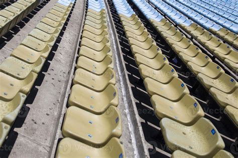 Closeup detail of the brown stadium seats 2051280 Stock Photo at Vecteezy