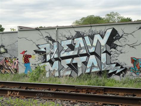 Instant Graffitication • Heavy Metal The graffiti along the Midtown...