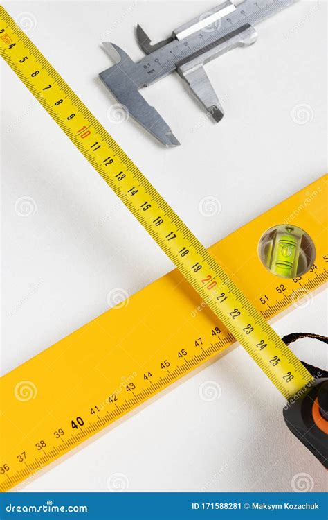 Yellow Spirit Level and Caliper Stock Image - Image of length, architect: 171588281