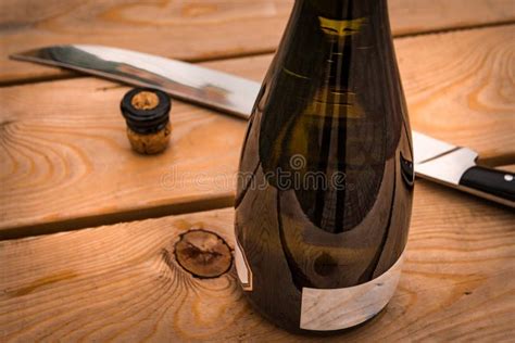 Sabrage is a Technique for Opening a Champagne Bottle with a Saber ...