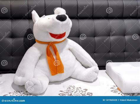 Soft Toy Polar Bear with an Orange Scarf Stock Photo - Image of polar, white: 141960428